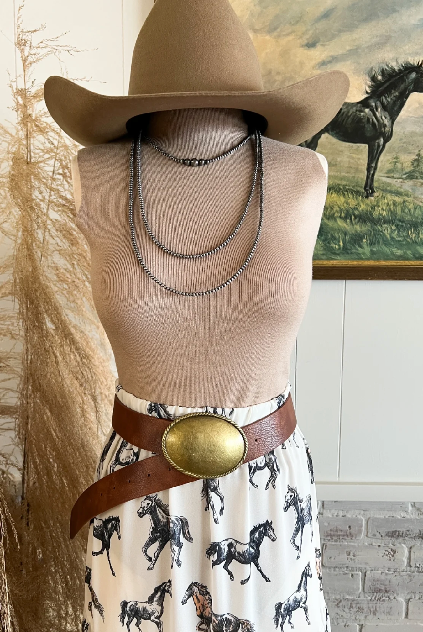 Mannequin sporting quality western attire