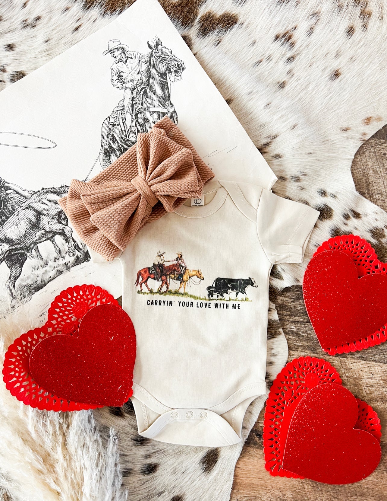 Carryin’ Your Love With Me Valentines Cowboy (Infant-S/S Onesie)(Toddler/Youth S/S Tee)(Cream)