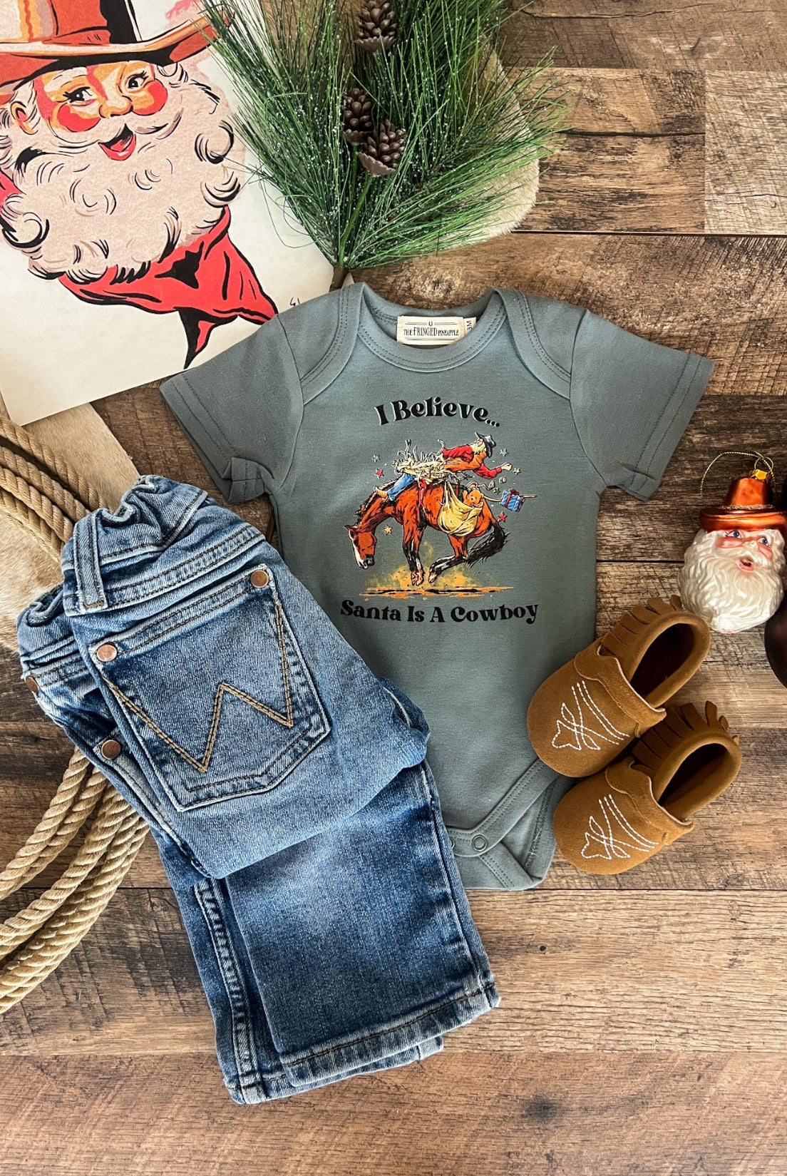 I Believe Santa Is A Cowboy Design (Onesie/Youth Tee)(Green)