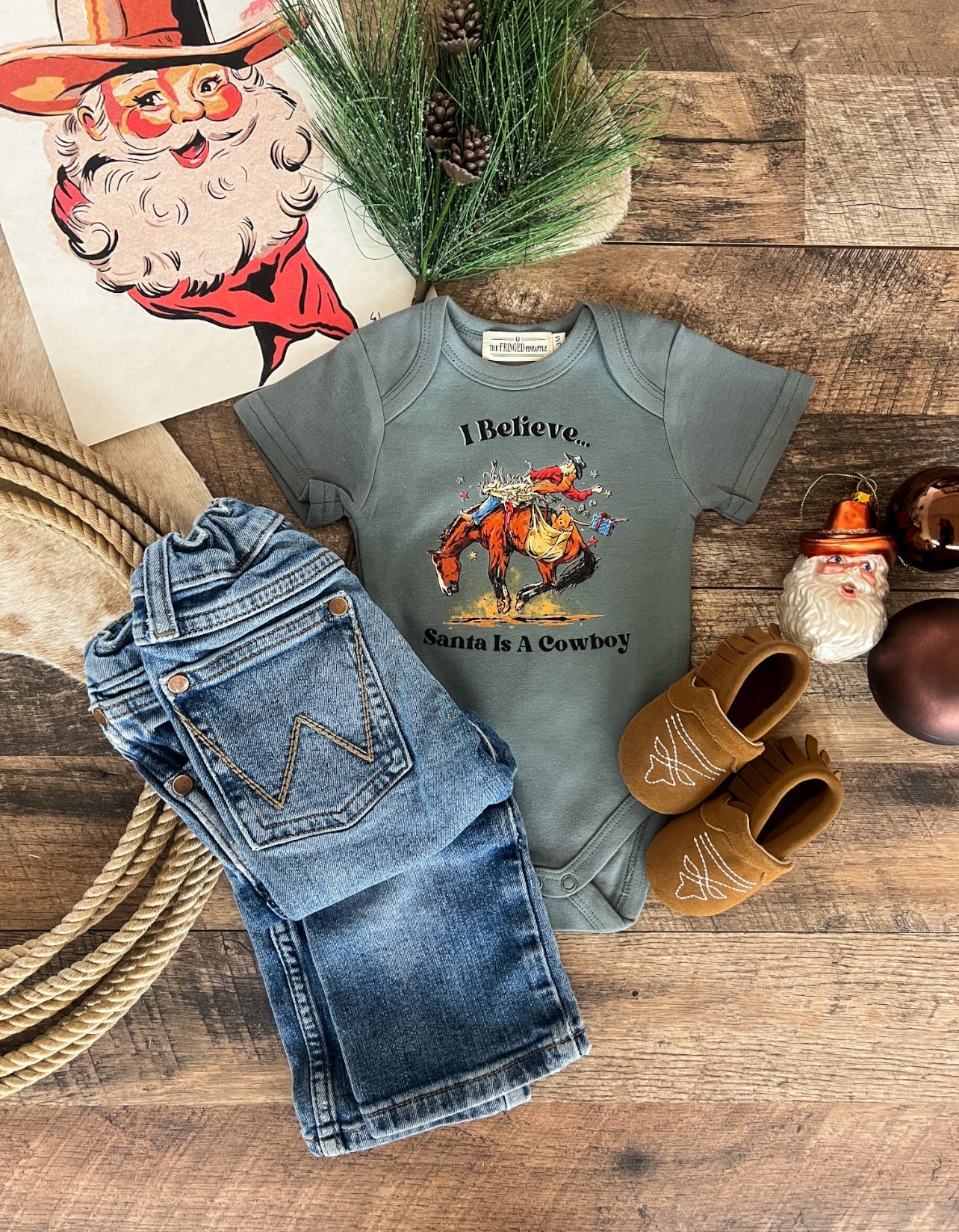 I Believe Santa Is A Cowboy Design (Onesie/Youth Tee)(Green)