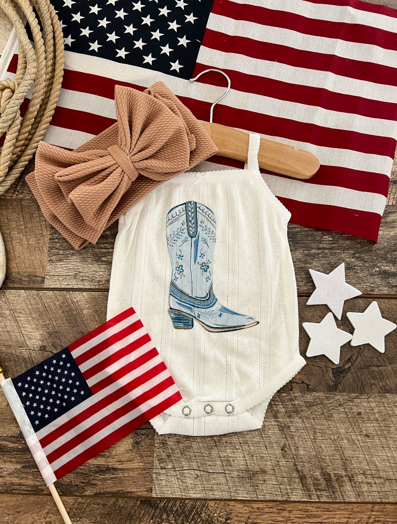 Blue Boot – White Infant Pointelle Onesie/Toddler Tank