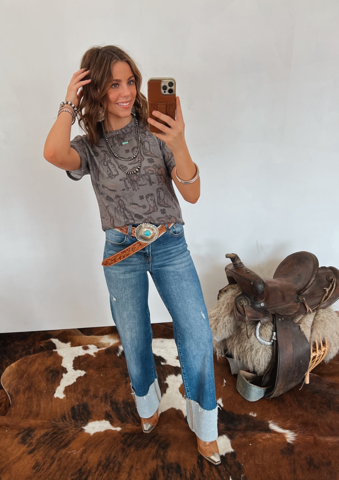 Teach Em’ Young Tee