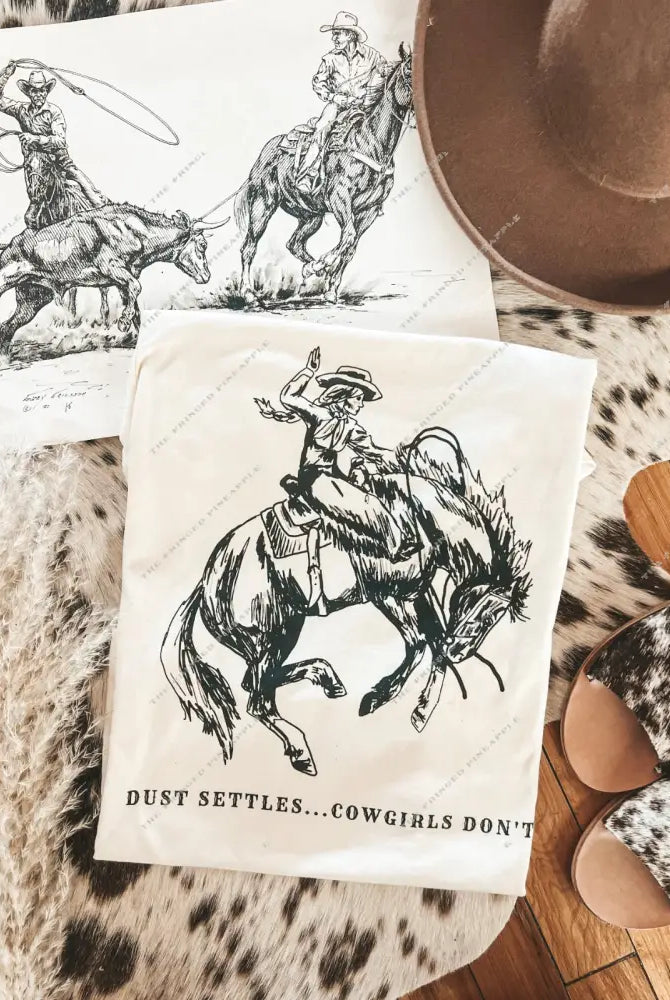 Dust Settles Cowgirls Don’t Tee or Sweatshirt (Adult)(Cream)