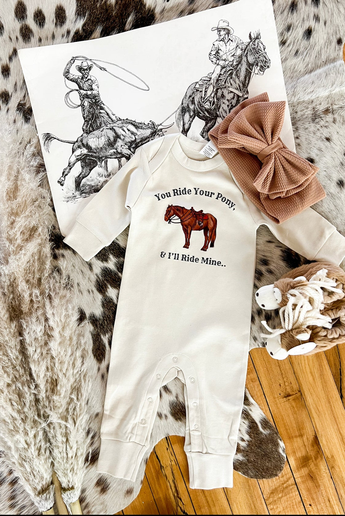 You Ride Your Pony I’ll Ride Mine (One Piece Long Sleeve Onesie)(Infant)(Cream)
