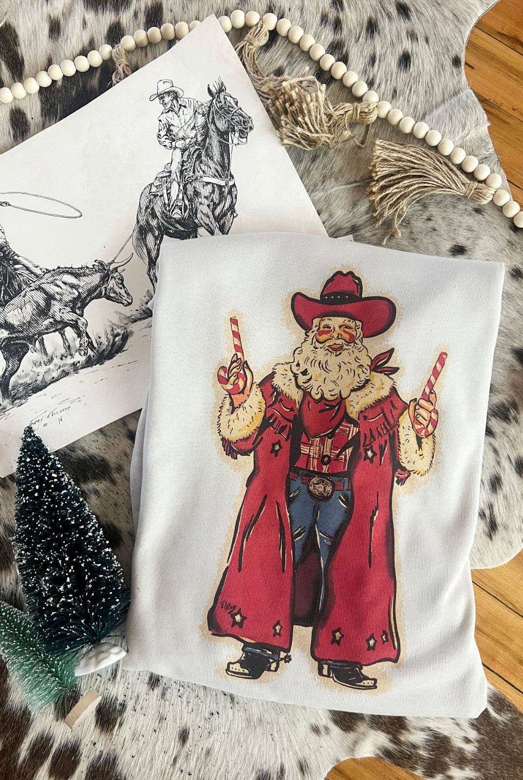 Outlaw Cowboy Santa Ranchin’ Design (Youth Onesie/Tee)(cream)