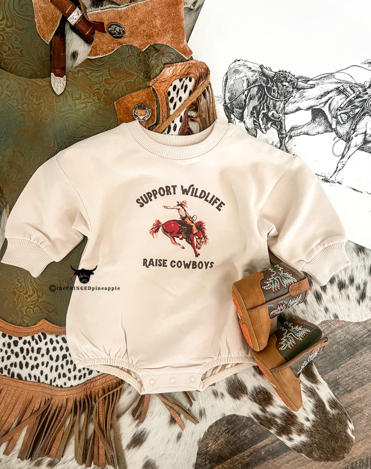 Support Wildlife Raise Cowboys Bubble Romper (Natural)