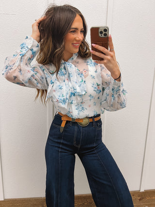  Model using a Blue Dream Baby Floral Front Tie Blouse
