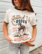 Fall Round-Up Rodeo “Pumpkin Wranglin’ Champion” Ringer Tee(Cream/Black)