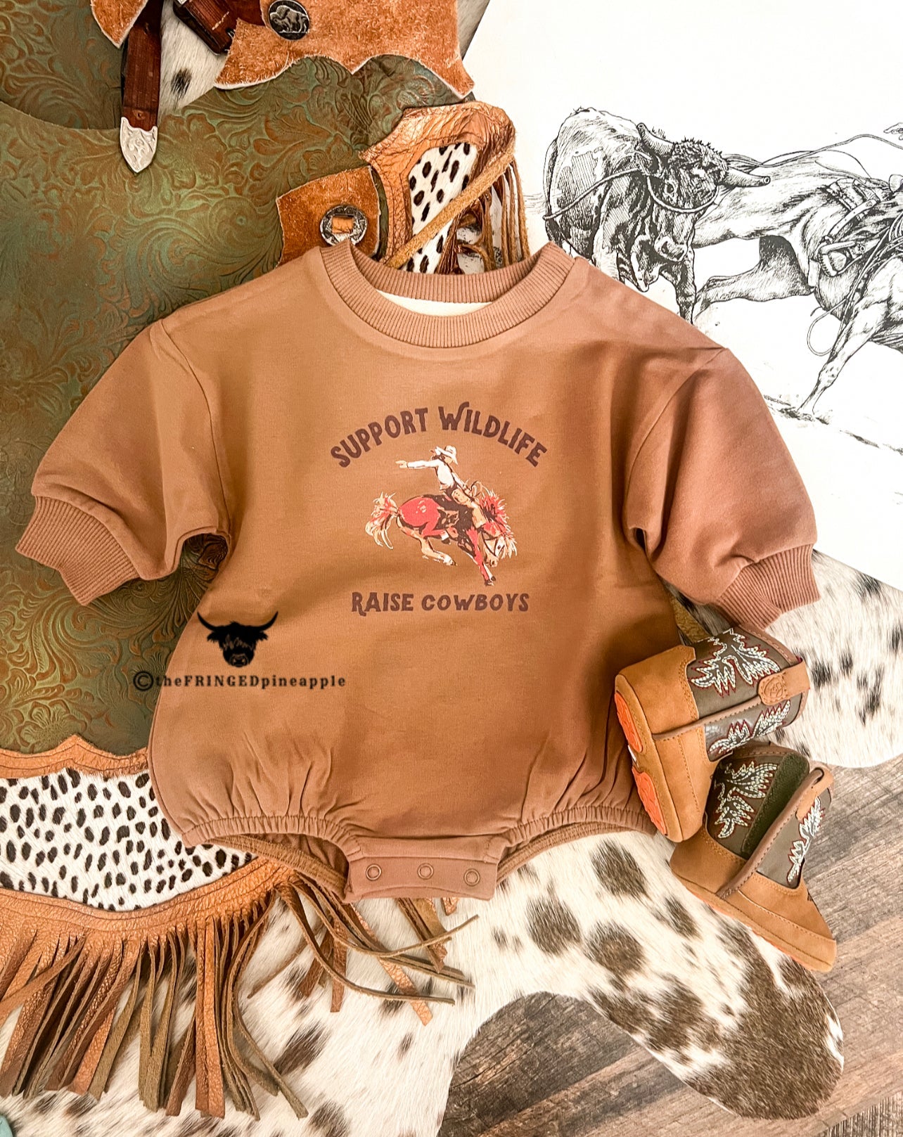 Support Wildlife Raise Cowboys Bubble Romper (cognac)