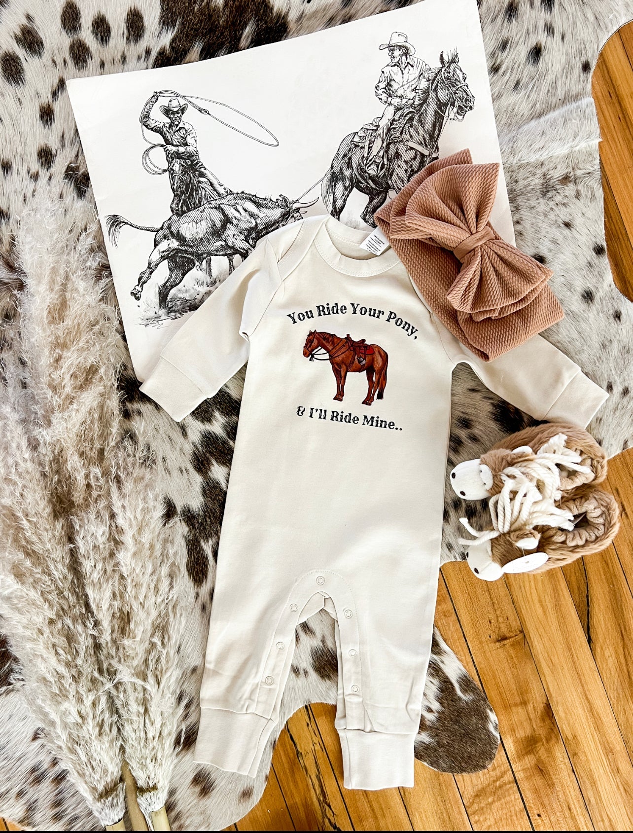 You Ride Your Pony I’ll Ride Mine (One Piece Long Sleeve Onesie)(Infant)(Cream)